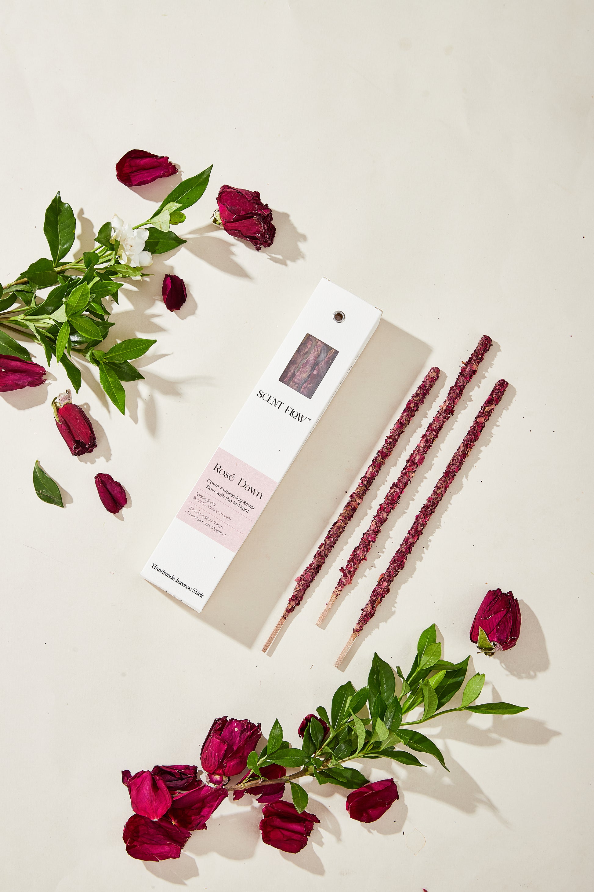 Romantic rose incense for love attraction and ritual, lit beside a bedside table with soft lighting